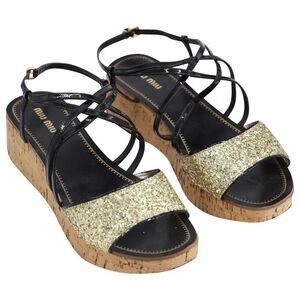 miu miu black and gold low wedge sandals